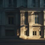 A photorealistic image of a government building facade with shadows falling across it, suggesting hidden activities, shot at dusk with dramatic lighting, no people visible, architectural details sharp